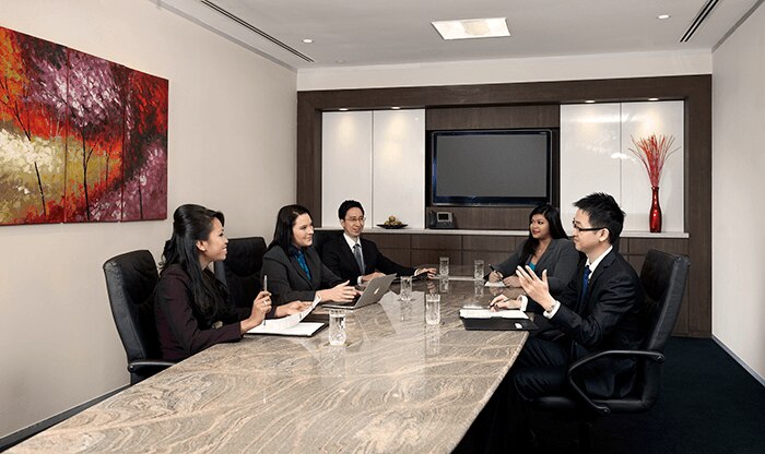 team-meeting-marina-bay-financial-centre-singapore-720x416.png